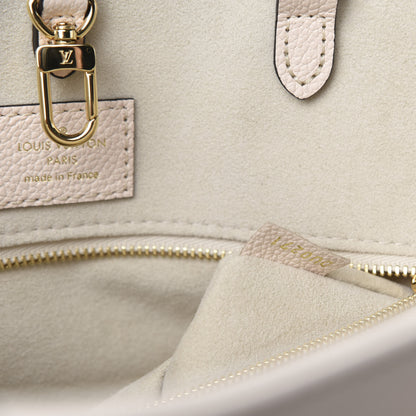 Louis Vuitton Empreinte Monogram Giant By The Pool Onthego MM Cream Saffron 10 of 11