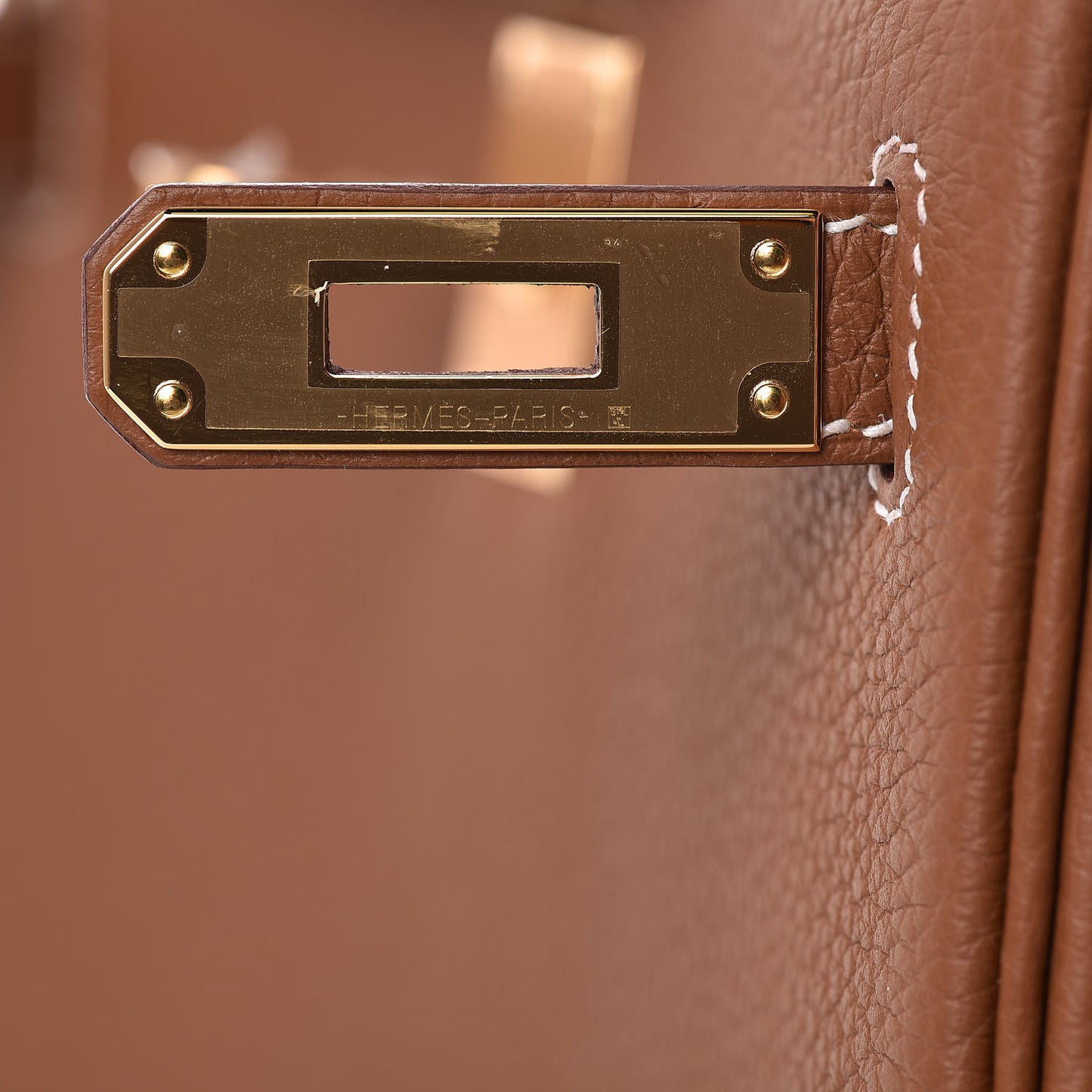 Togo Kelly Ado Backpack Gold