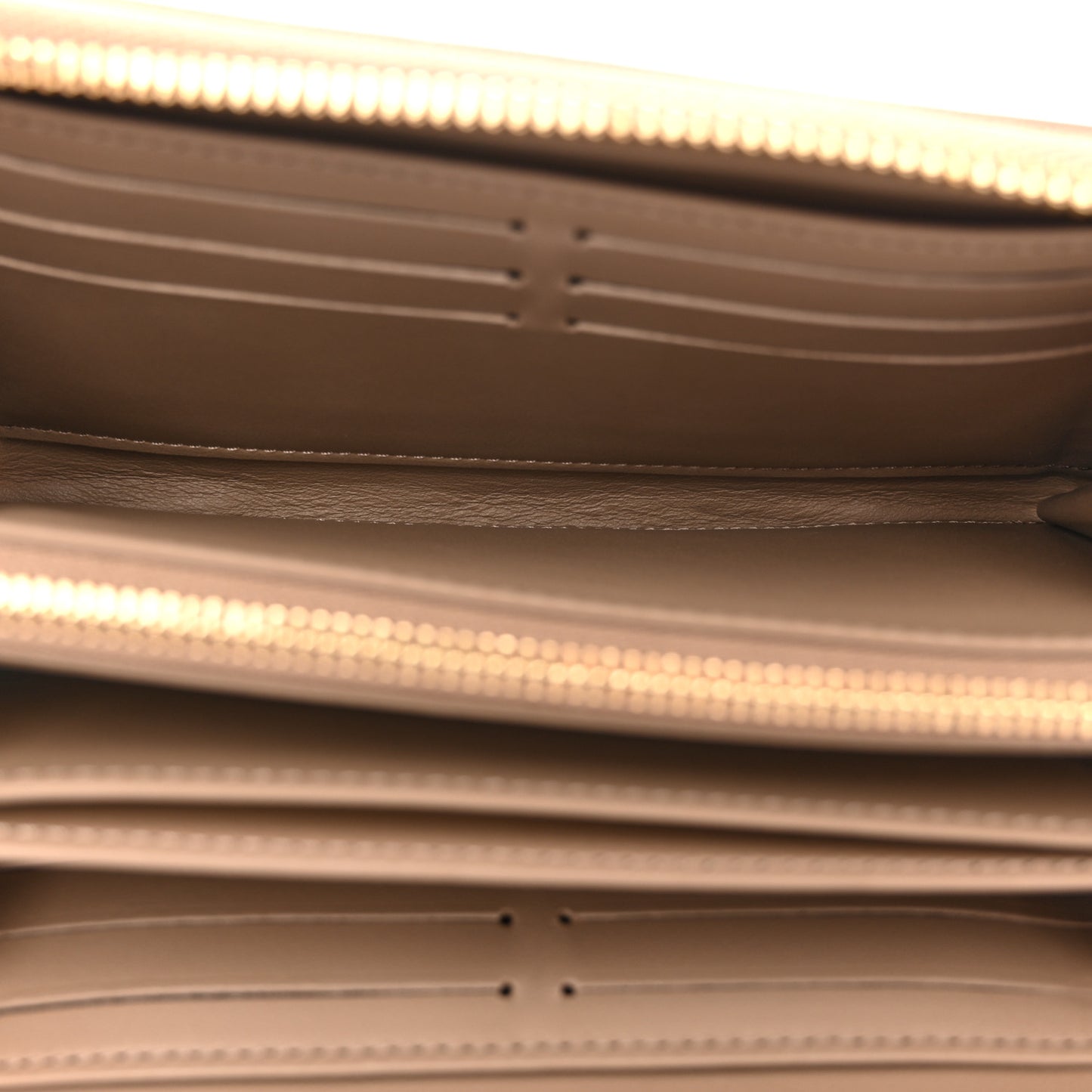 Lambskin Embossed Monogram Coussin Zippy Wallet Taupe