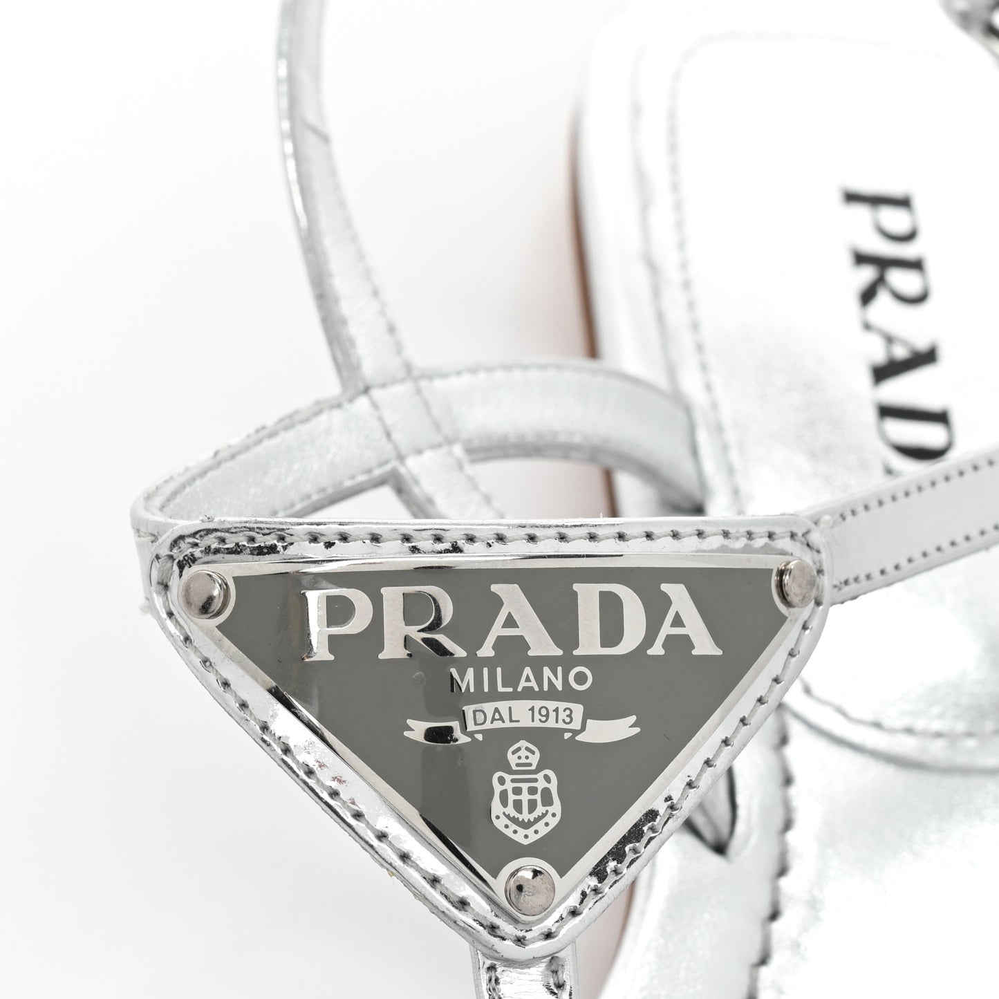 Metallic Calfskin Metal Triangle Logo Slingback Flat Thong Sandals 38.5 Argento