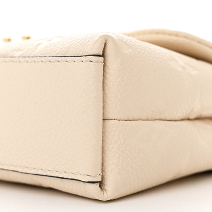 Louis Vuitton Empreinte Monogram Nano Madeleine Creme 9 of 10