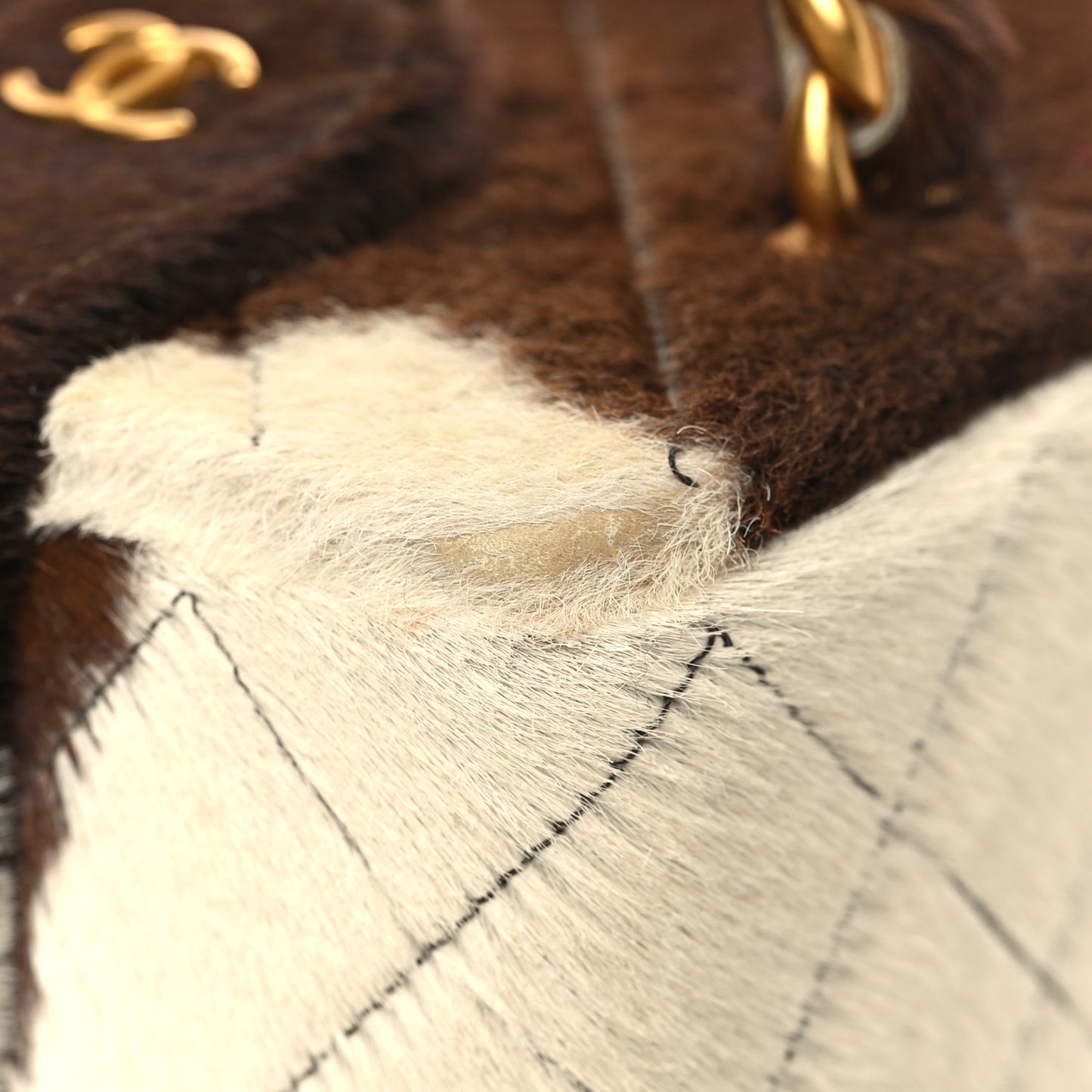 Pony Hair Quilted Cow Print Mini Top Handle Vanity Case Brown White