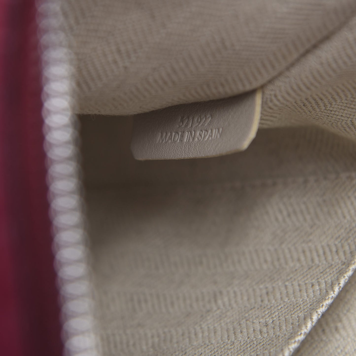 Calfskin Embossed Repeat T Pouch Raspberry
