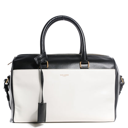 Saint Laurent Smooth Calfskin Small Bi Color Duffle 6 Black White 1 of 9