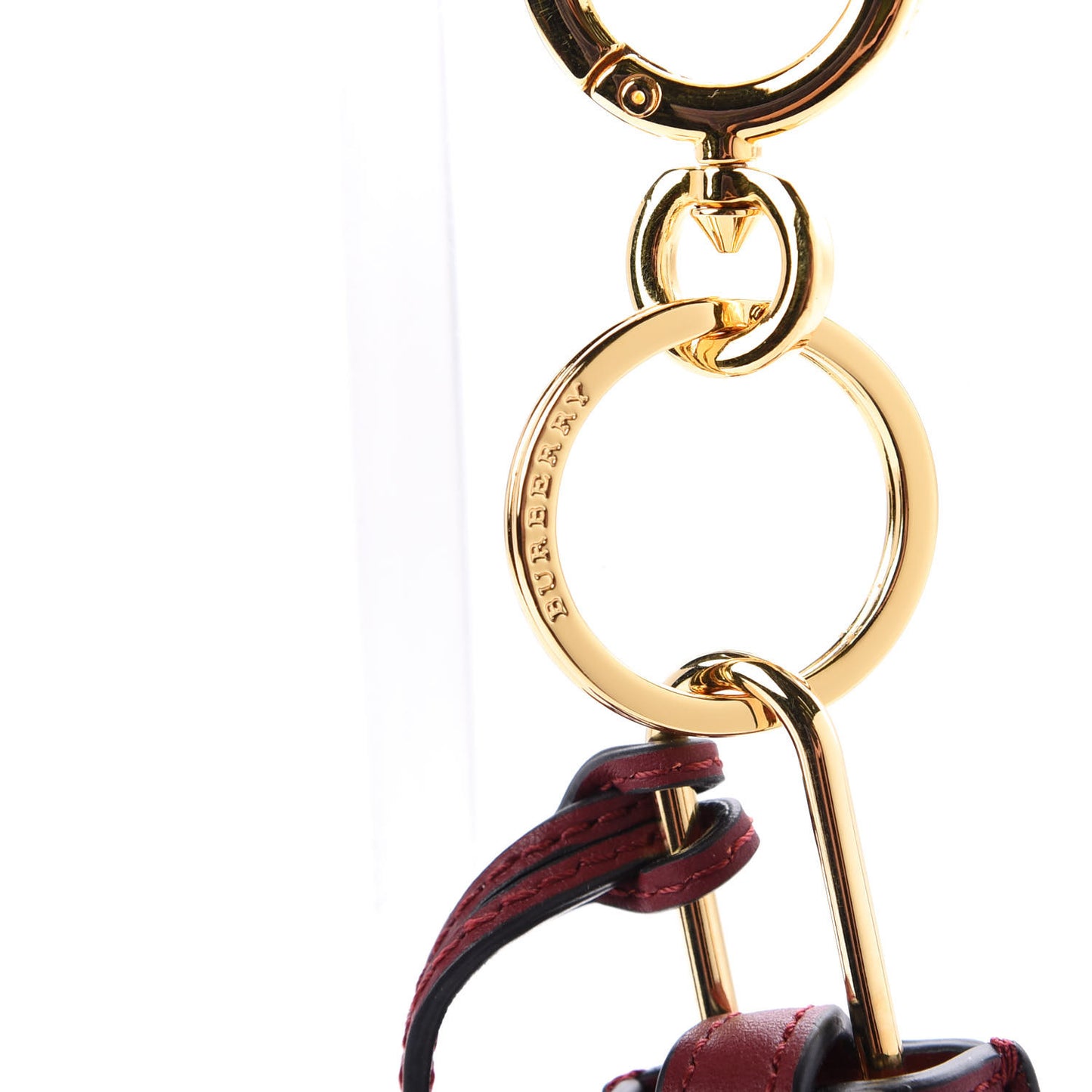 Calfskin Studded Zig Zag Lock Bag Charm Crimson