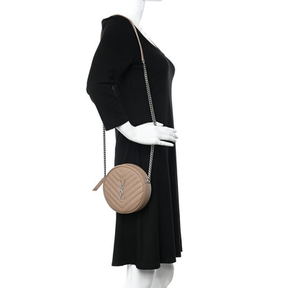 Saint Laurent Grain De Poudre Matelasse Chevron Quilted Round Vinyle Camera Bag Dark Beige 2 of 10