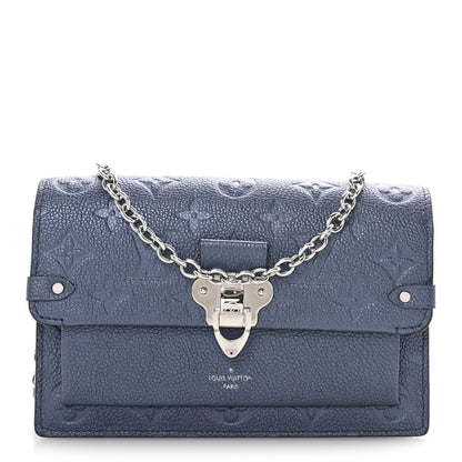 Louis Vuitton Metalli Empreinte Monogram Vavin Chain Wallet Navy Nacre 1 of 9