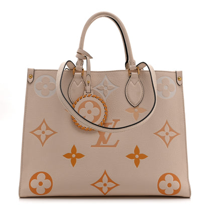 Louis Vuitton Empreinte Monogram Giant By The Pool Onthego MM Cream Saffron 1 of 9