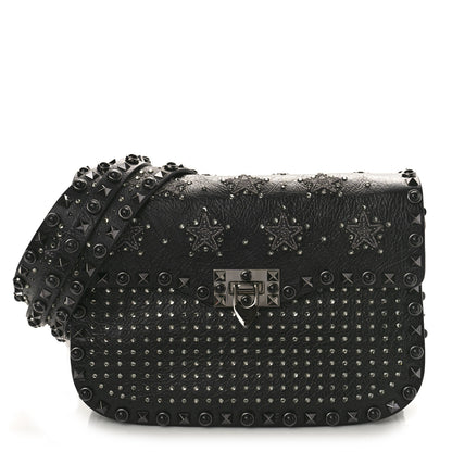Valentino Garavani Pebbled Calfskin Crystal Embroidered Star Medium Rockstud Rolling Flap Saddle Bag Black 1 of 8