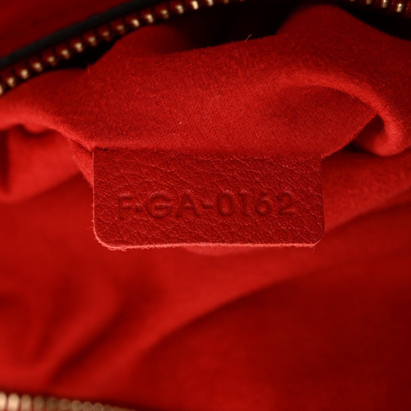 Drummed Calfskin Medium Luggage Coquelicot