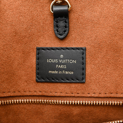 Louis Vuitton Empreinte Monogram Giant Wild At Heart Onthego MM Caramel 6 of 9
