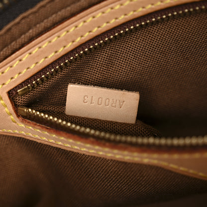 Louis Vuitton Monogram Trotteur 7 of 11