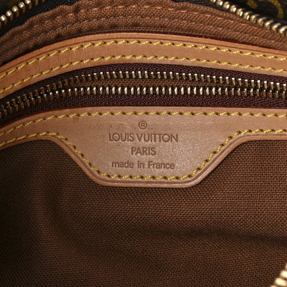 Louis Vuitton Monogram Trotteur 6 of 10