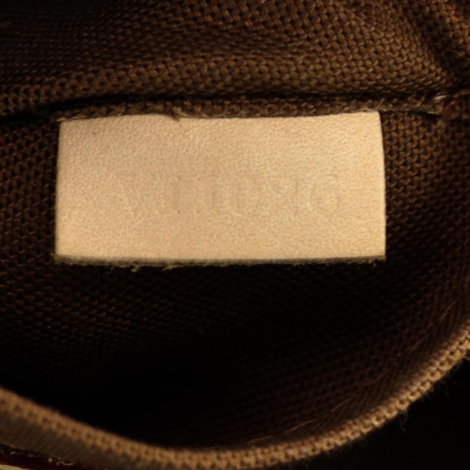 Louis Vuitton Monogram Riveting 8 of 11