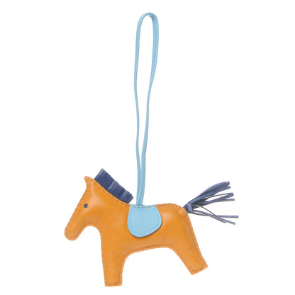 Hermes Milo Lambskin Grigri Rodeo Horse Bag Charm MM Naturel Bouton D'Or Celeste Bleu Saphir 1 of 4