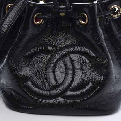 Chanel Shiny Aged Calfskin CC Chain Mini Drawstring Bag Black 12 of 13
