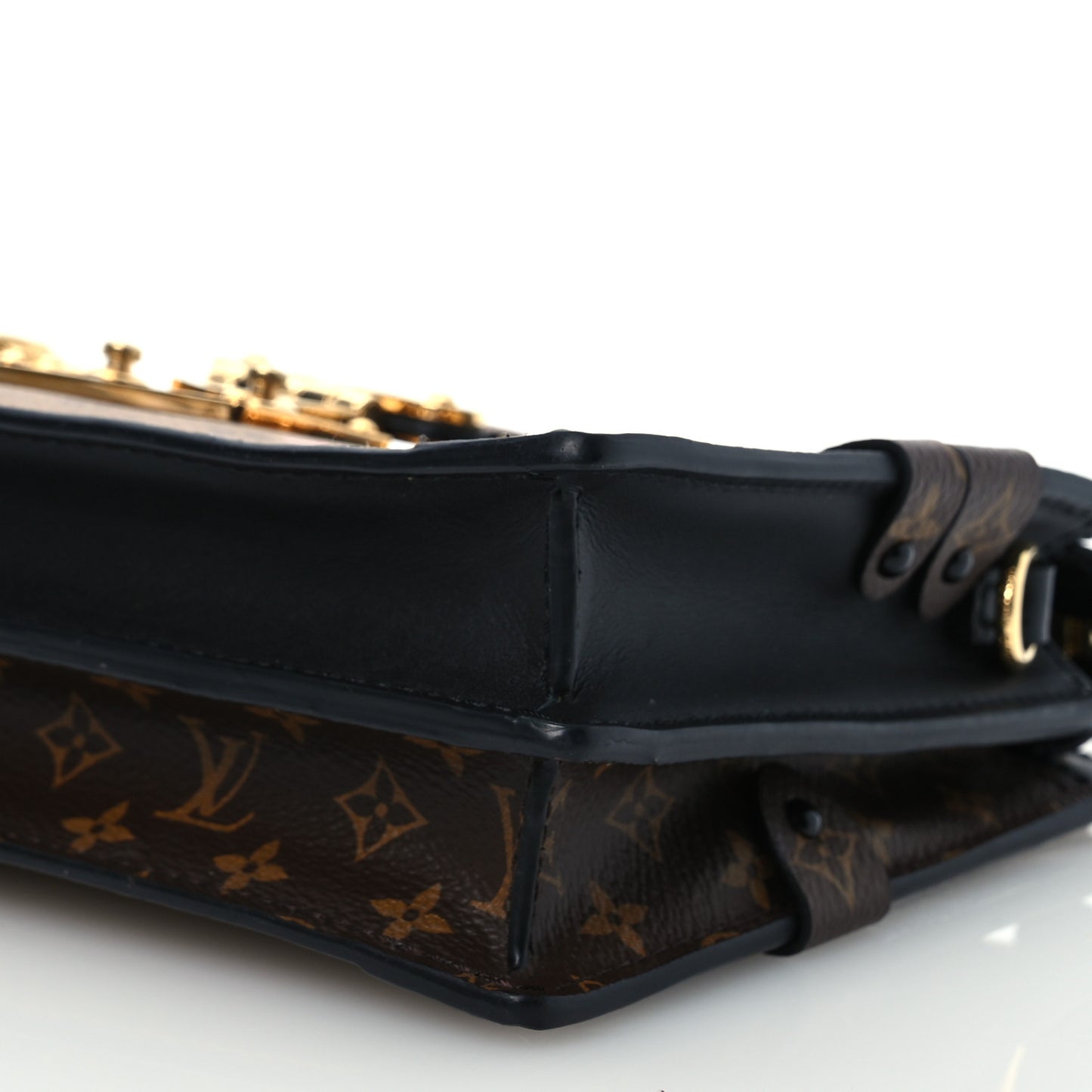 Reverse Monogram Trunk Clutch