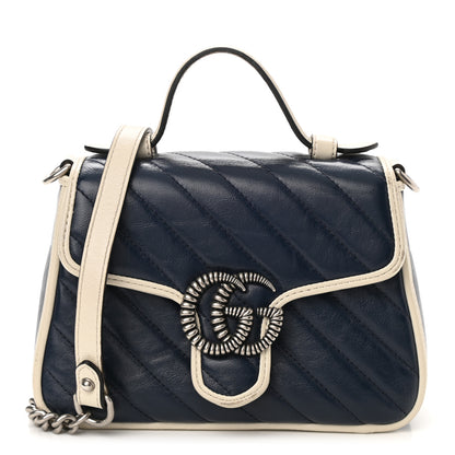 Gucci Vintage Effect Calfskin Matelasse Diagonal Mini Torchon GG Marmont Top Handle Shoulder Bag Blue Agata Mystic White 1 of 8