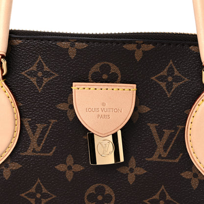 Louis Vuitton Monogram Rivoli MM 9 of 15