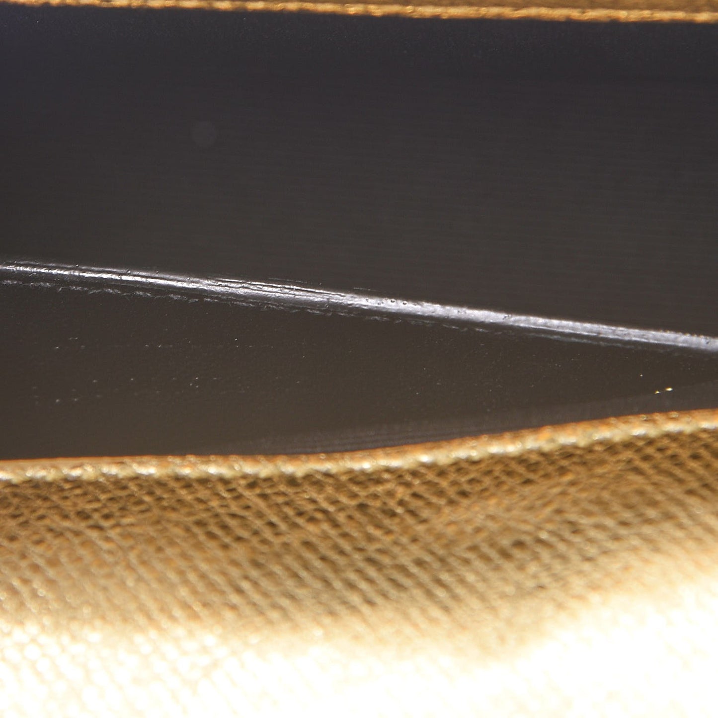 Metallic Textured Calfskin Classic Monogram Tassel Clutch Gold