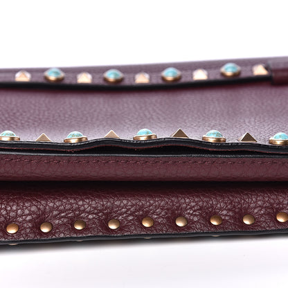 Valentino Garavani Pebbled Calfskin Rockstud Rolling Wristlet Clutch Rubin 8 of 11