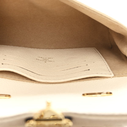 Louis Vuitton Empreinte Monogram Nano Madeleine Creme 5 of 9