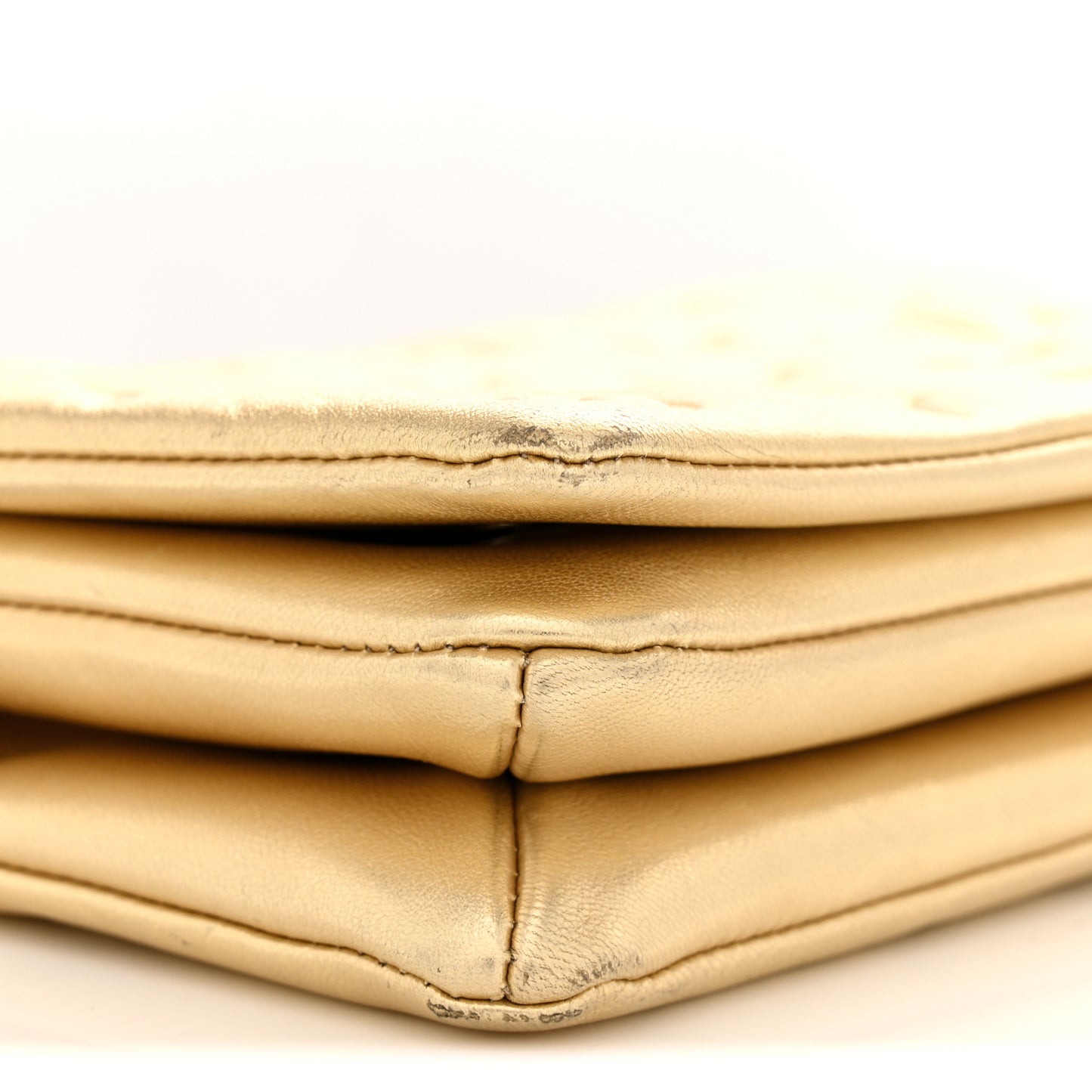 Metallic Lambskin Embossed Monogram Pochette Coussin Gold