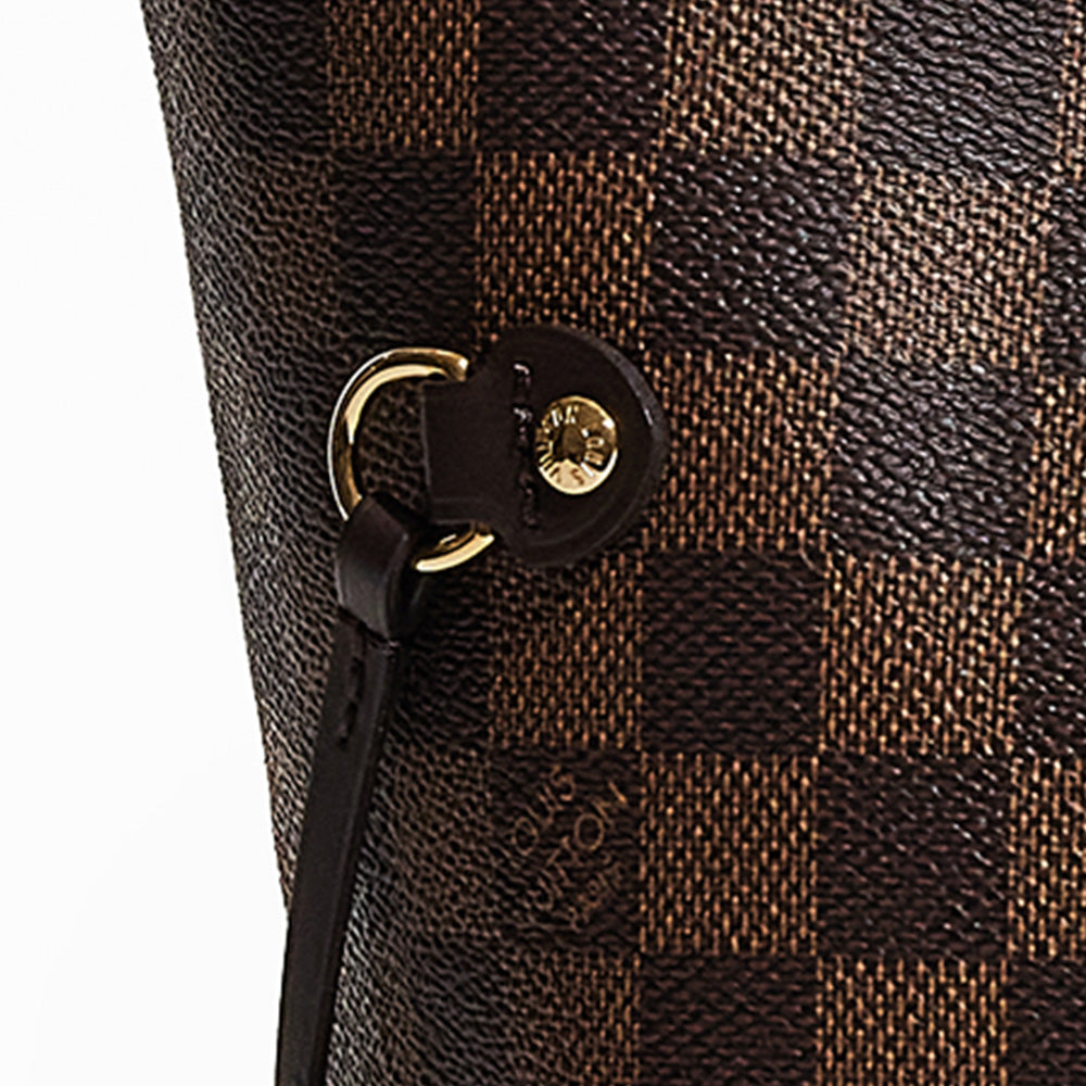 this is a close up image of an authentic damier ebene louis vuitton neverfull's hardware by fashionphile