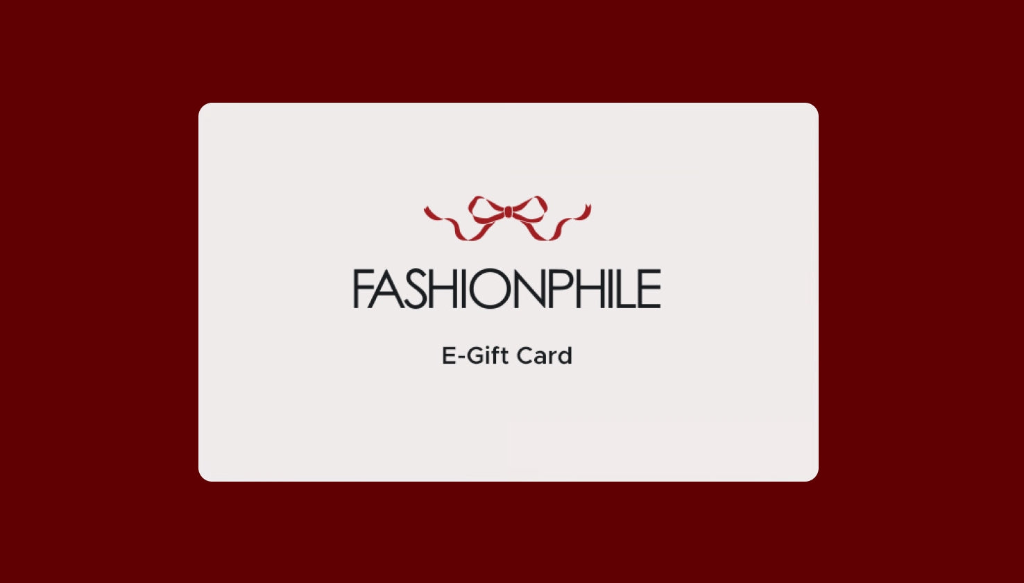 FASHIONPHILE E-Gift Card in black text with red bow graphic at top against a beige card shape background also against a red color background