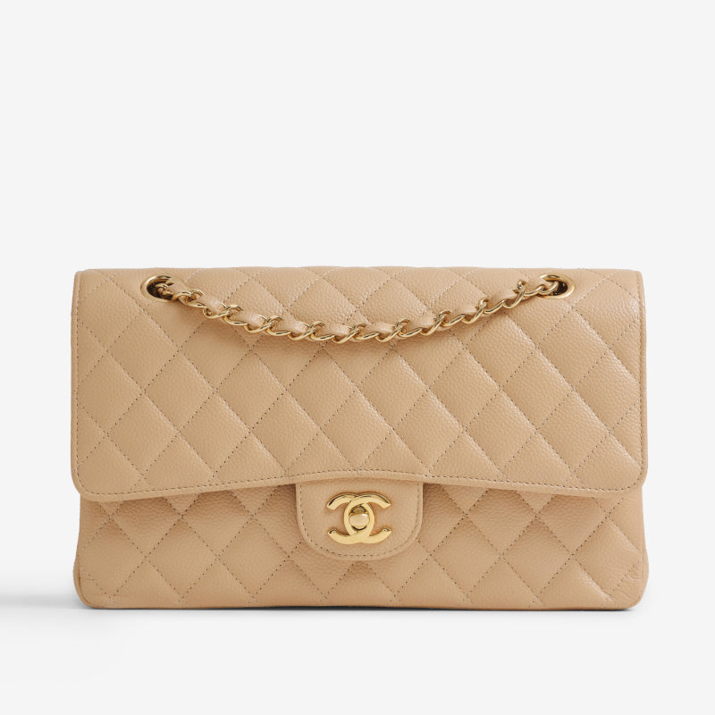 chanel caviar quilted double flap bag in beige color with gold tone hardware