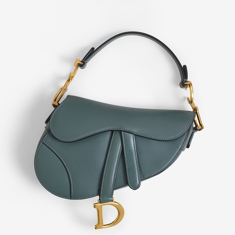 one dark green Christian Dior mini saddle bag with gold tone hardware