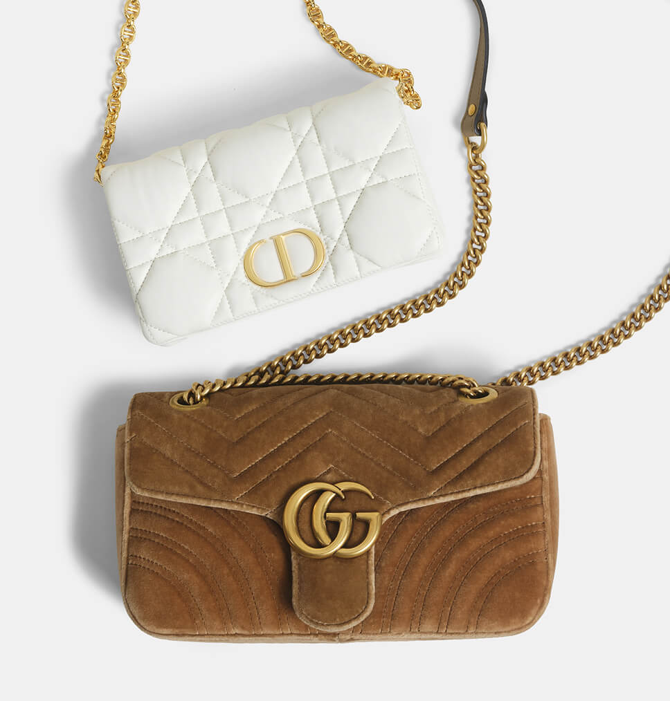Christian Dior handbag above a Gucci handbag.