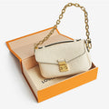 one LOUIS VUITTON Empreinte Pochette Metis East West Cream sitting in a box