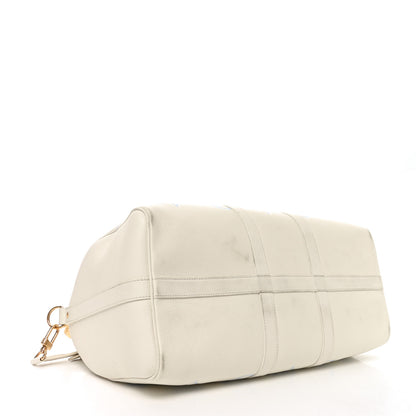 Louis Vuitton Empreinte Monogram Keepall Bandouliere 45 Latte Candy Blue 3 of 9