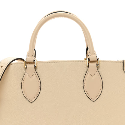 Louis Vuitton Empreinte Monogram Giant Onthego PM Cream Beige 5 of 9