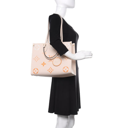 Louis Vuitton Empreinte Monogram Giant By The Pool Onthego MM Cream Saffron 2 of 12