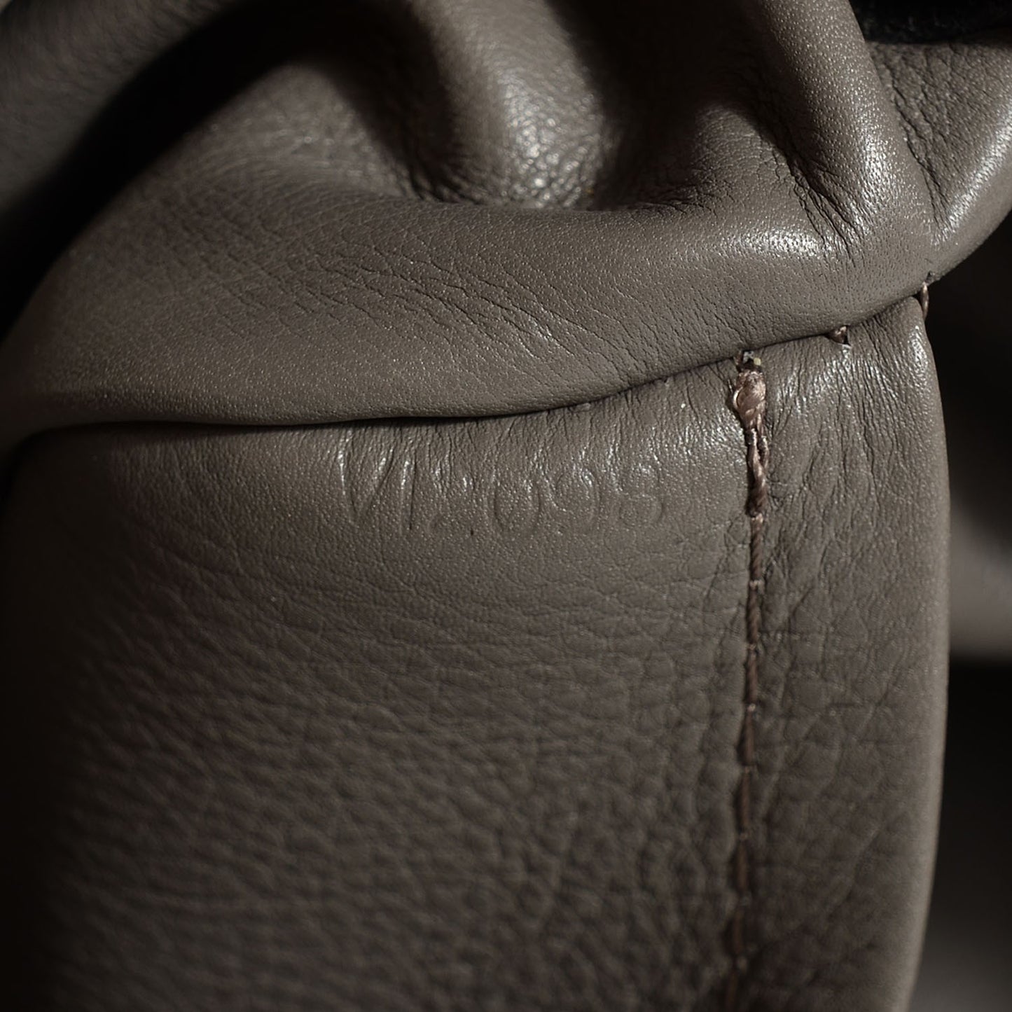 Monogram Suede Embossed Whisper PM Kohl