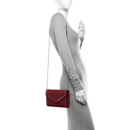 Valentino Garavani Pebbled Calfskin Rockstud Envelope Wallet on Chain Rubino 2 of 13