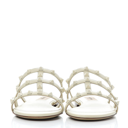 Valentino Garavani Calfskin Lacquered Monochrome Rockstud Caged Flat Slide Sandals 37.5 Ivory 2 of 9