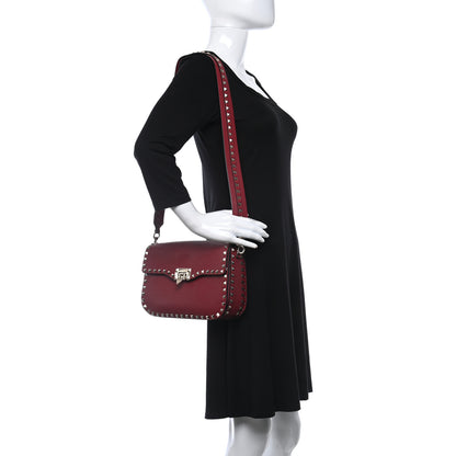 Valentino Garavani Pebbled Calfskin Medium Rockstud Flap Saddle Bag Rubino 2 of 10