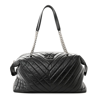 Chanel Aged Calfskin Chevron Quilted Duffle Bag Black 1 of 10