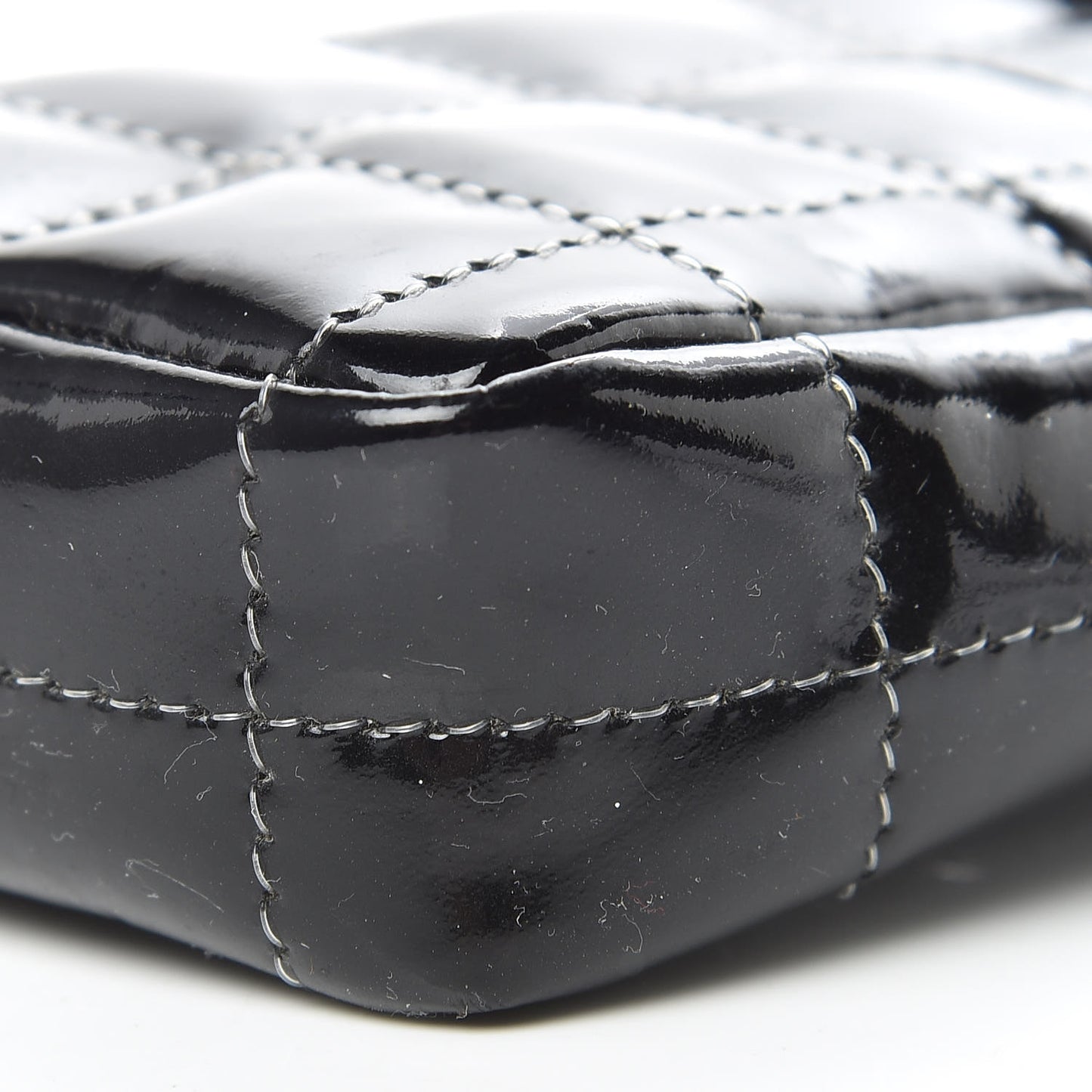 Patent Calfskin Chocolate Bar Reissue Phone Holder Black