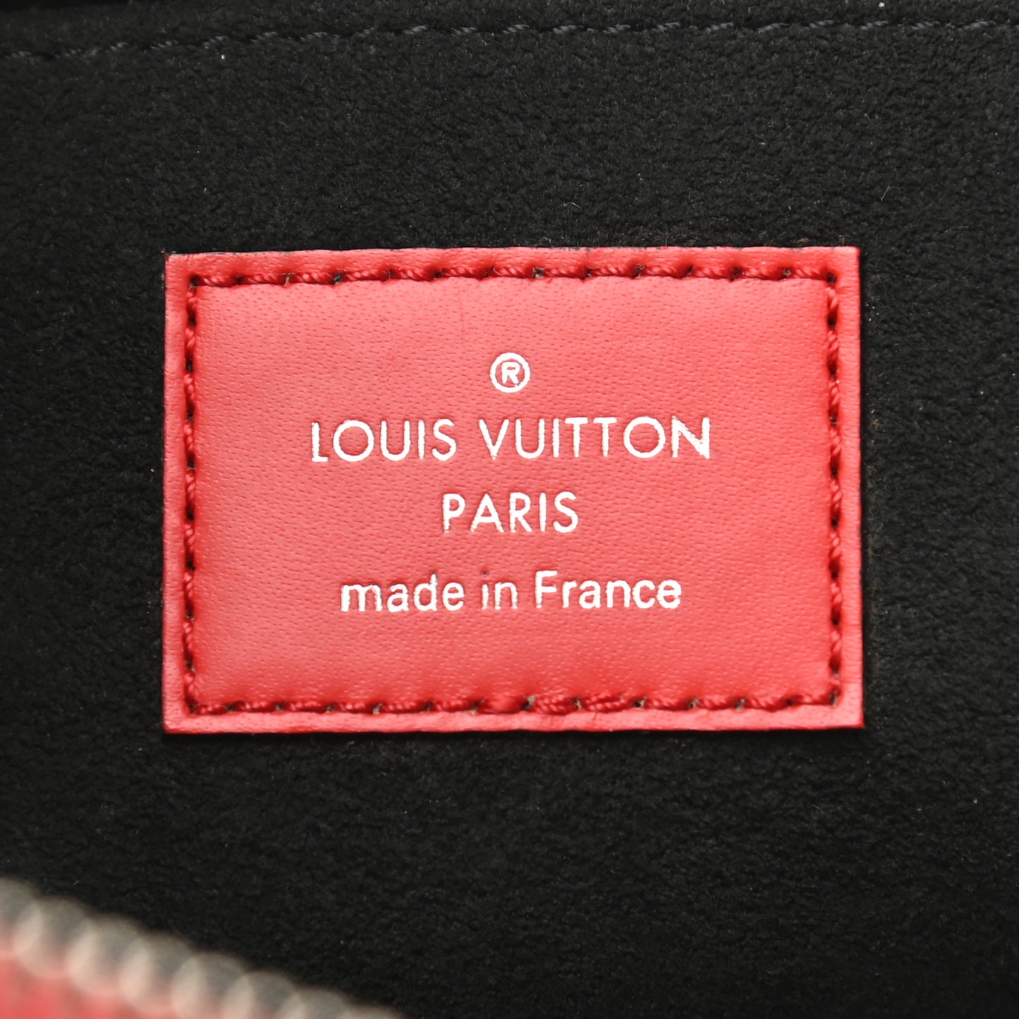 X SUPREME Epi Pochette Jour GM Red