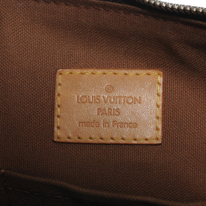 Louis Vuitton Monogram Tulum PM 7 of 8