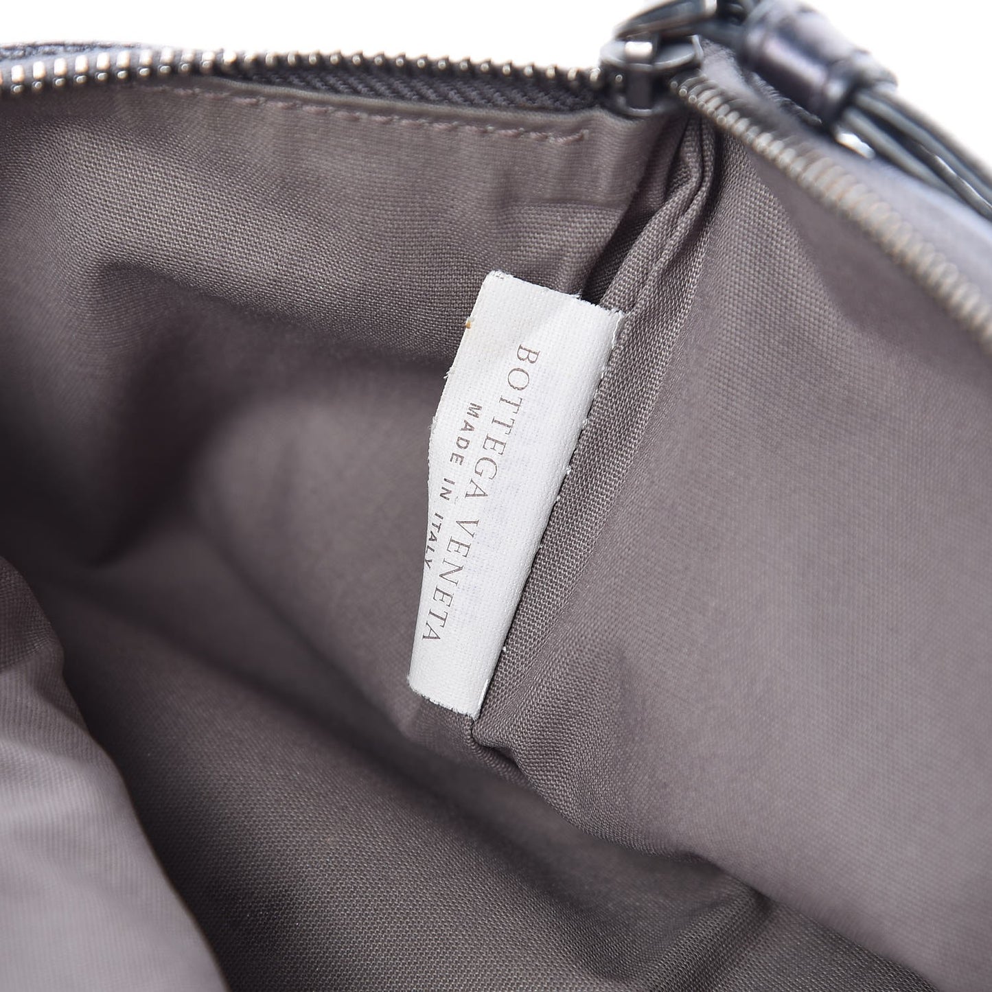 Vitello Intrecciato Pouch Argento Ossidato