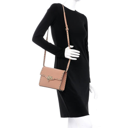 Valentino Garavani Pebbled Calfskin Medium Rockstud Flip Lock Crossbody Bag Skin Sorbet 2 of 7