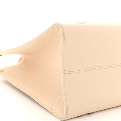 Louis Vuitton Empreinte Monogram Giant Onthego MM Creme Rose Trianon 8 of 9