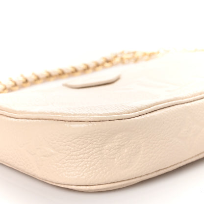 Louis Vuitton Empreinte Monogram Giant Multi Pochette Accessories Mini Pochette Cream 7 of 9
