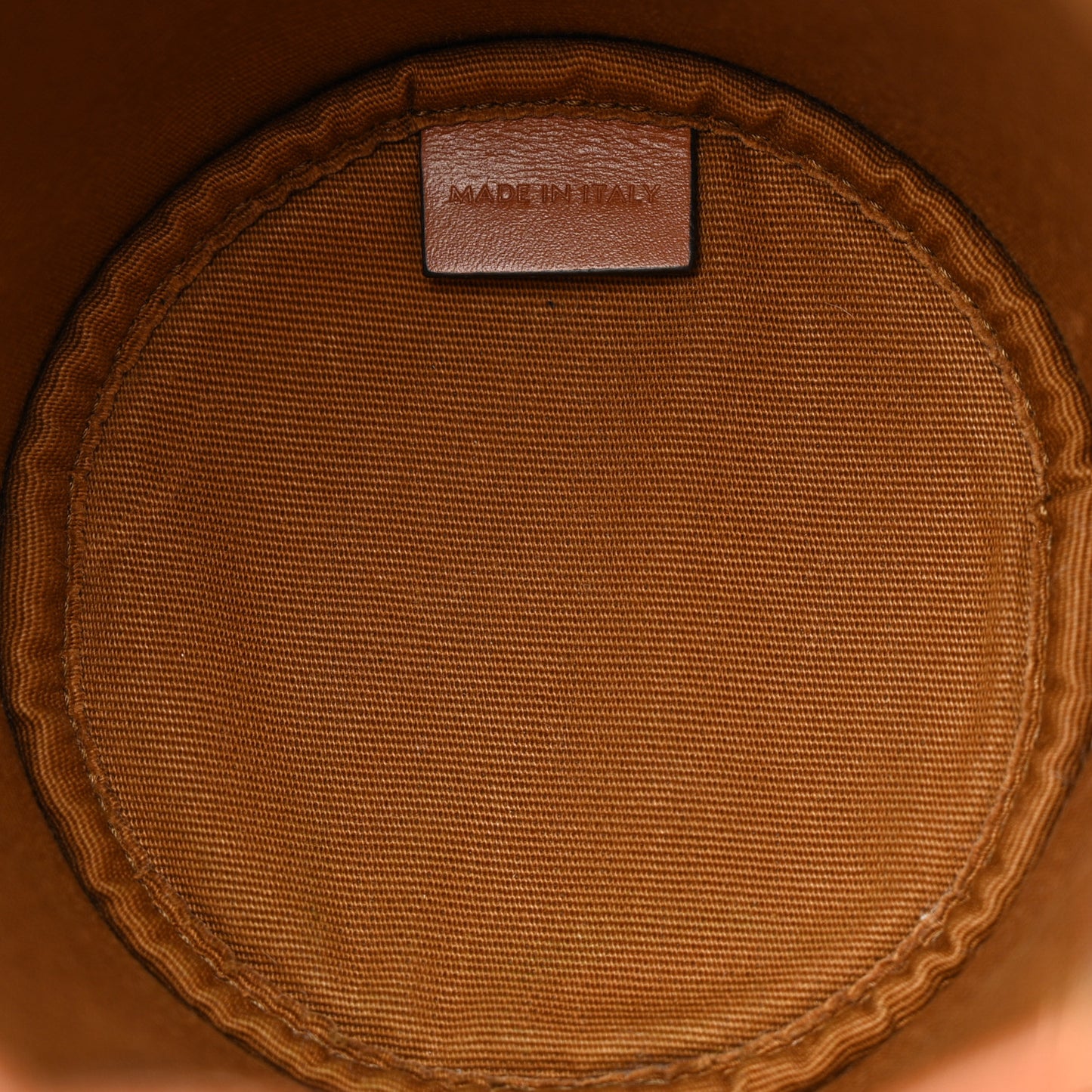 Triomphe Canvas Calfskin Micro Drawstring Bucket Bag White Tan