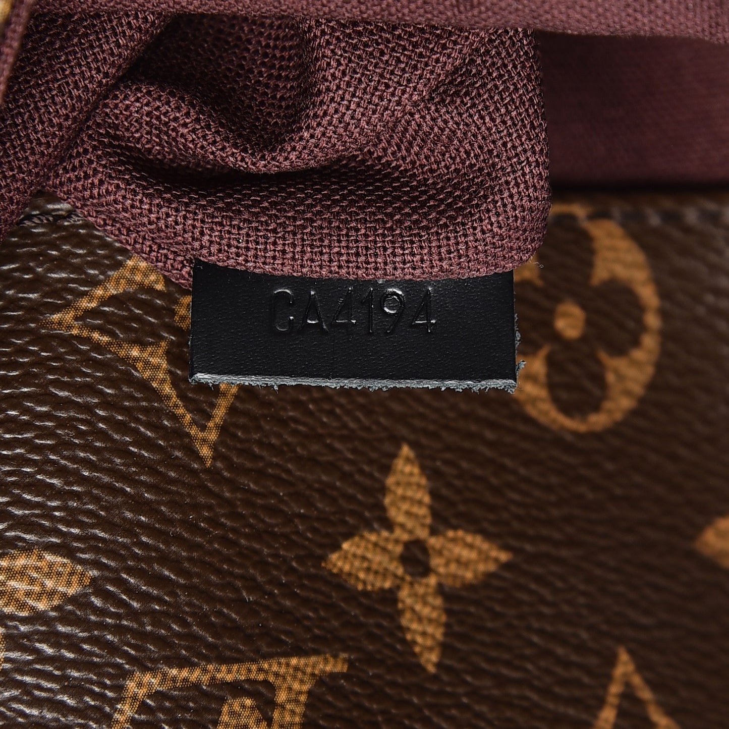 Monogram Macassar District MM